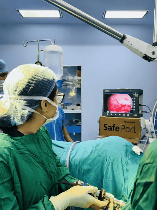 Dr. Shachi Singh performing surgical steps with advanced laparoscopic instruments